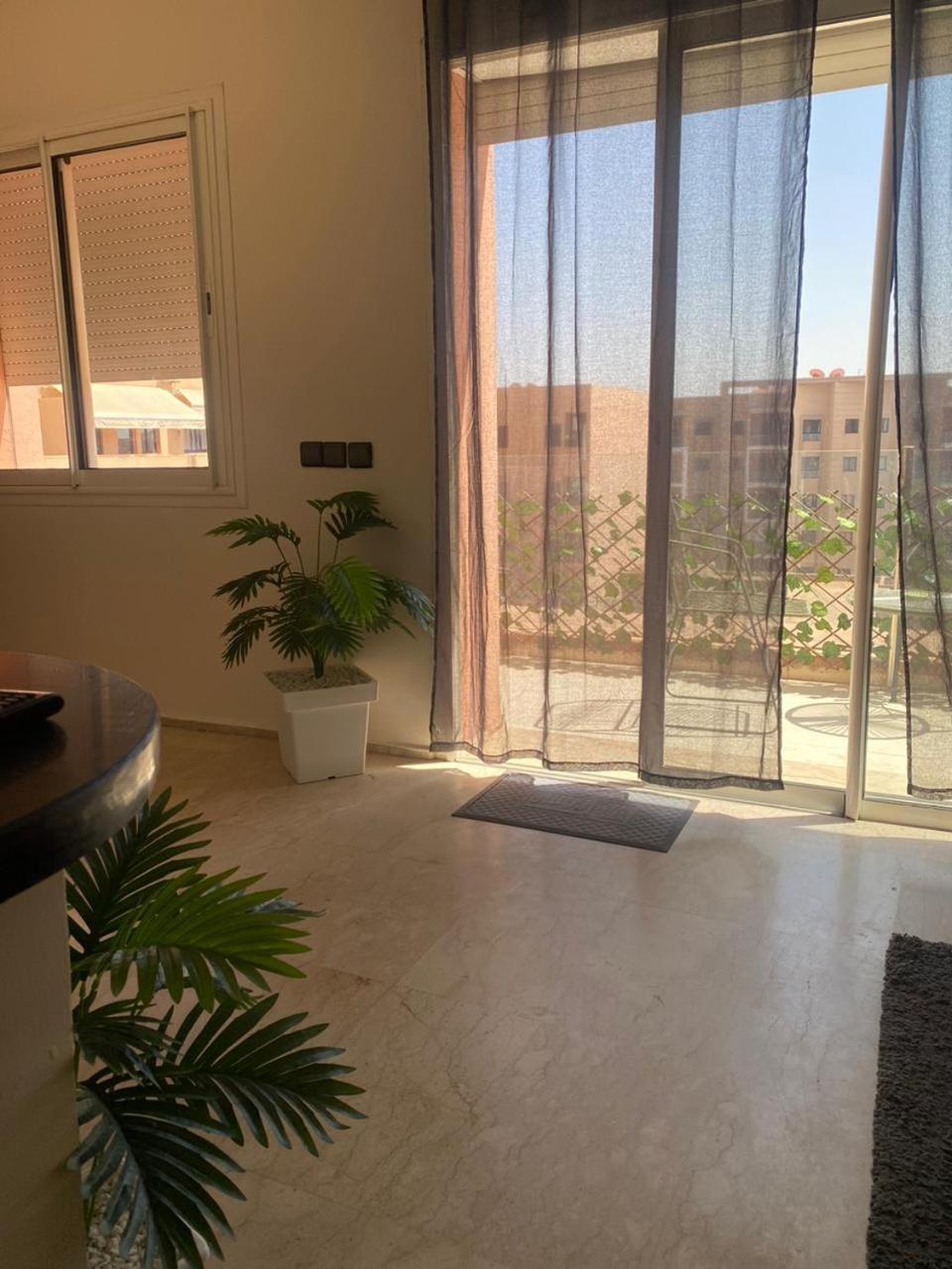 Cosy Appartement Au Centre De Marrakech มาร์ราเกช ภายนอก รูปภาพ